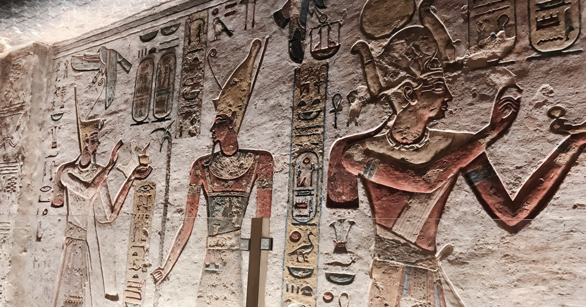etchings and paintings in a tomb at the Valley of the Kings - Featured Image